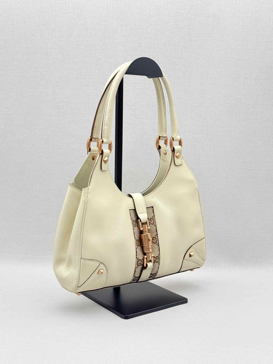 Pre-loved GUCCI Jackie Nailhead Beige GG Hobo bag at Reems Closet
