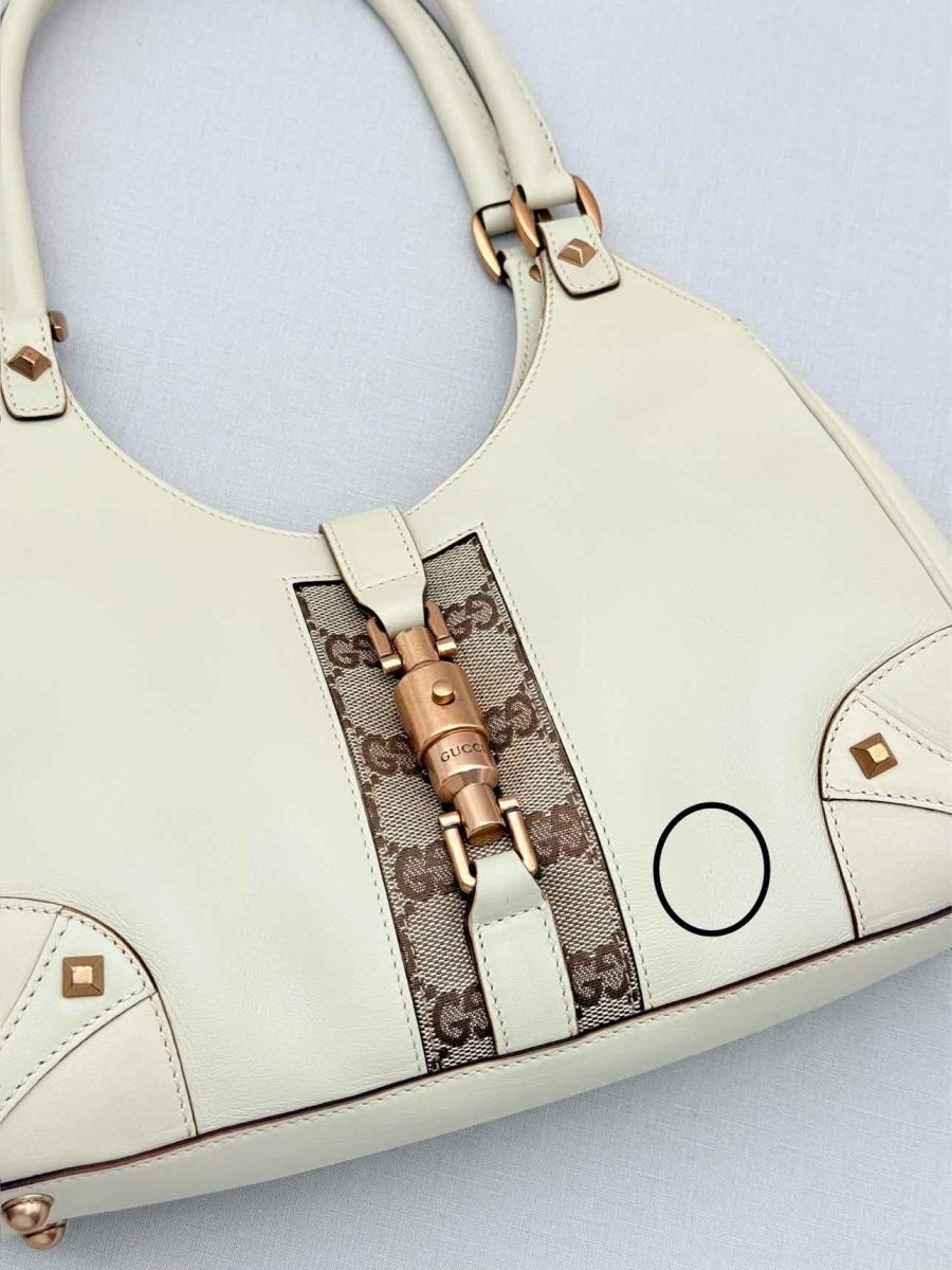 Pre-loved GUCCI Jackie Nailhead Beige GG Hobo bag at Reems Closet