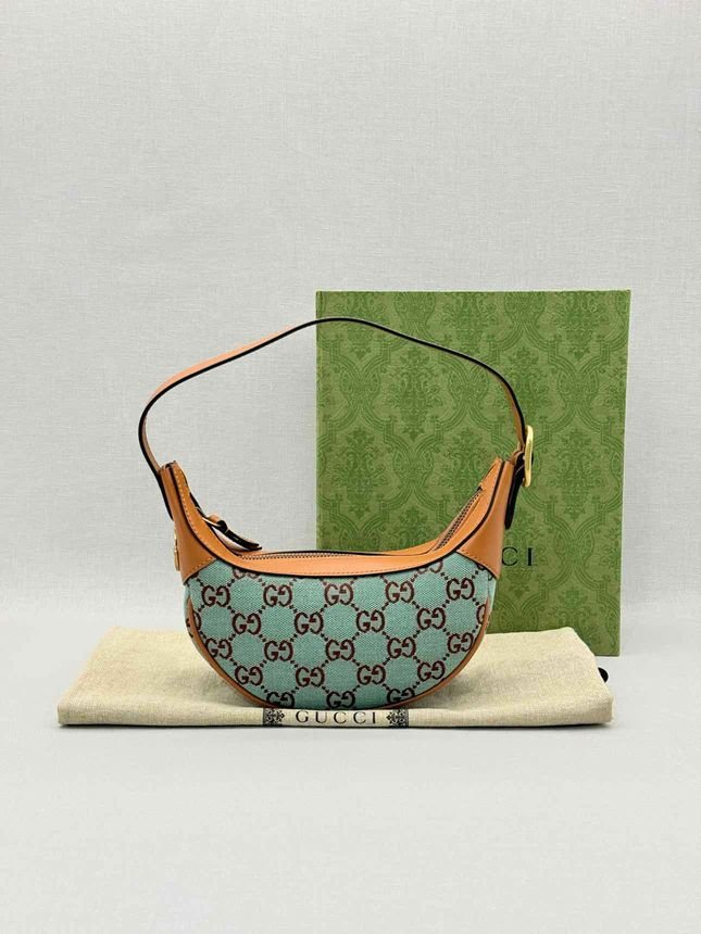 Pre - loved GUCCI Ophidia Blue GG Supreme Hobo bag at Reems Closet