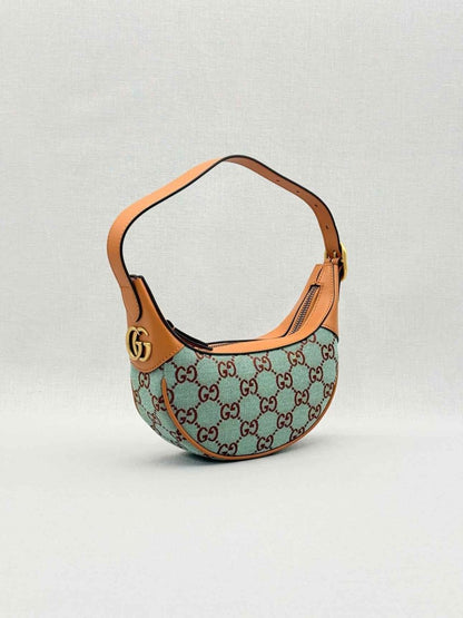 Pre - loved GUCCI Ophidia Blue GG Supreme Hobo bag at Reems Closet