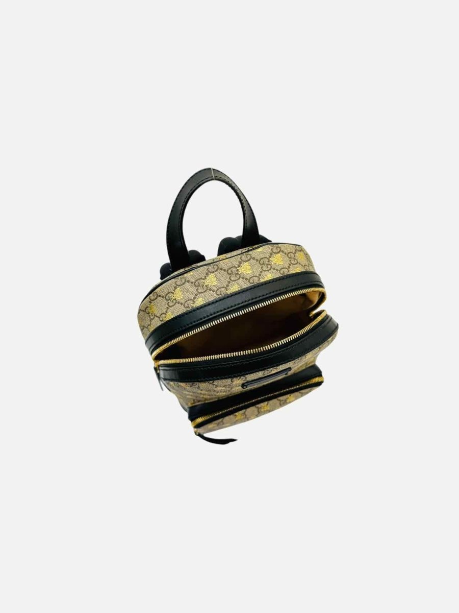 Pre - loved GUCCI Ophidia Brown & Black GG Supreme Bees Backpack at Reems Closet