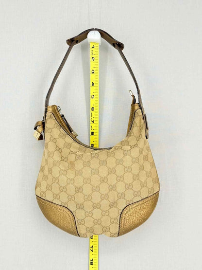 Pre-loved GUCCI Princy Brown & Bronze GG Monogram Hobo bag at Reems Closet