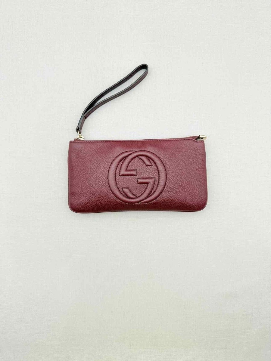 Pre - loved GUCCI Soho Burgundy GG Embossed Wristlet at Reems Closet