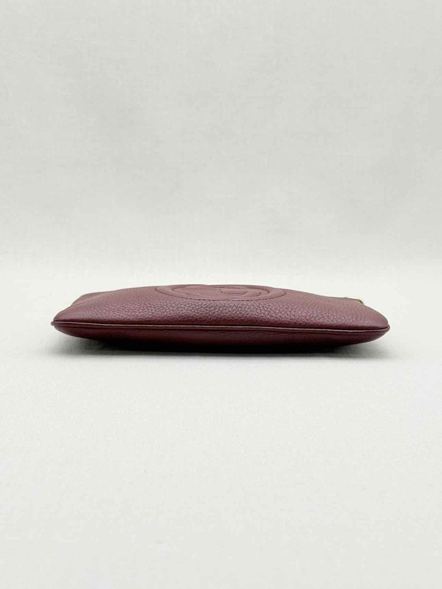 Pre - loved GUCCI Soho Burgundy GG Embossed Wristlet at Reems Closet