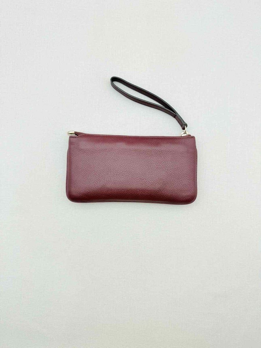 Pre - loved GUCCI Soho Burgundy GG Embossed Wristlet at Reems Closet