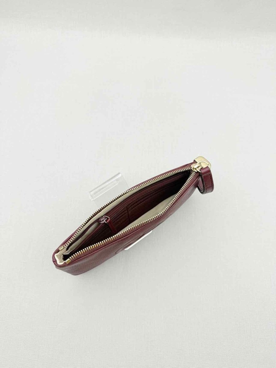 Pre - loved GUCCI Soho Burgundy GG Embossed Wristlet at Reems Closet