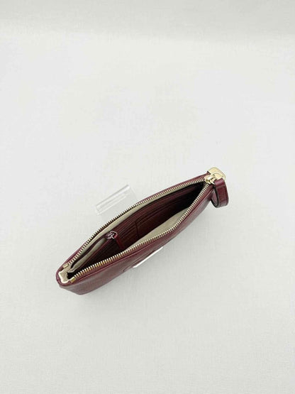 Pre - loved GUCCI Soho Burgundy GG Embossed Wristlet at Reems Closet