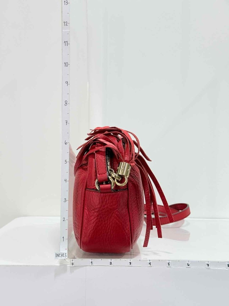 Pre-loved GUCCI Soho Disco Red Embossed Crossbody at Reems Closet