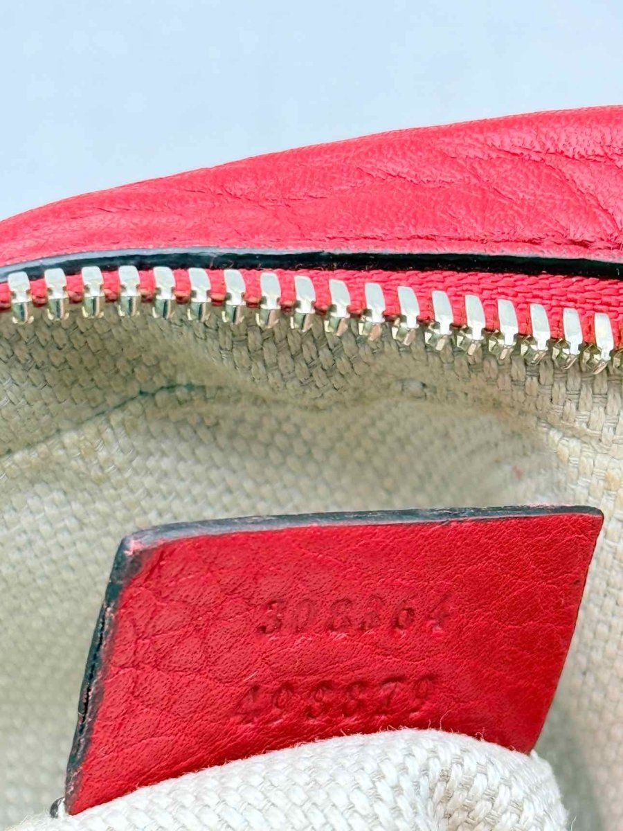 Pre-loved GUCCI Soho Disco Red Embossed Crossbody at Reems Closet