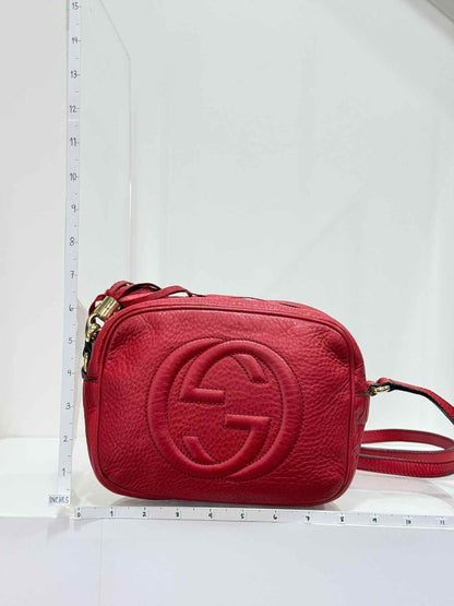 Pre-loved GUCCI Soho Disco Red Embossed Crossbody at Reems Closet