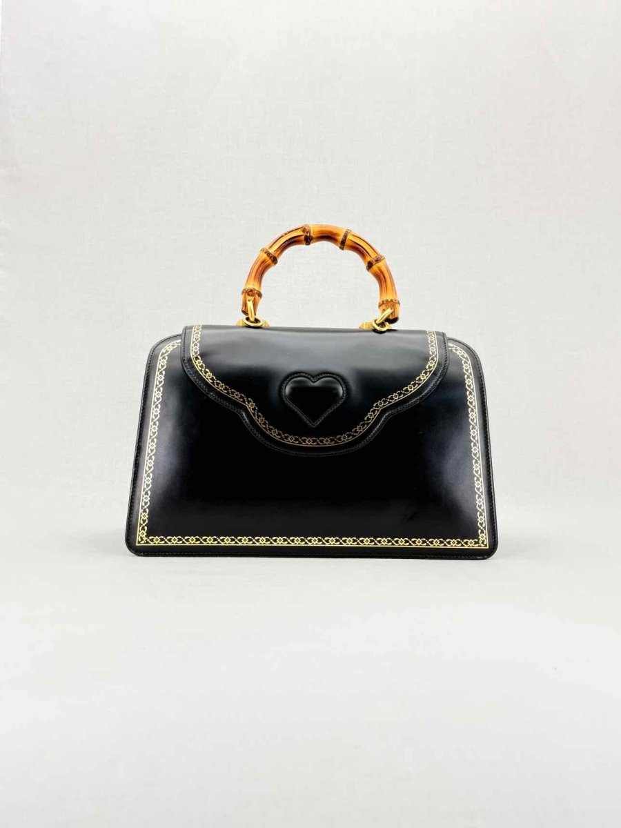 Pre - loved GUCCI Tiara Black Tiger Top Handle at Reems Closet