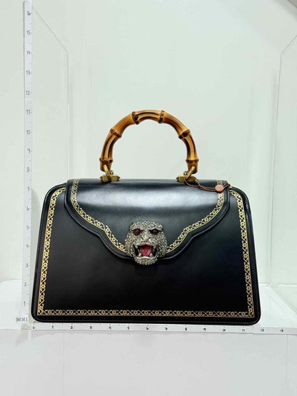 Pre - loved GUCCI Tiara Black Tiger Top Handle at Reems Closet