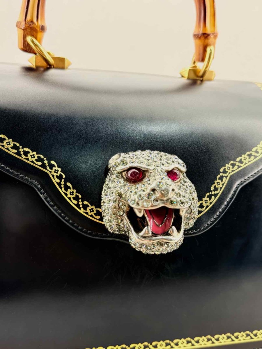 Pre - loved GUCCI Tiara Black Tiger Top Handle at Reems Closet