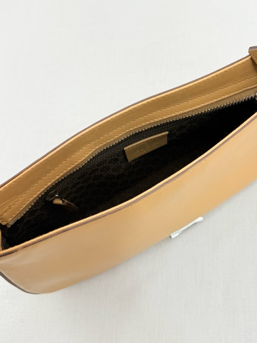 Pre - loved GUCCI Vintage Beige Baguette Bag at Reems Closet