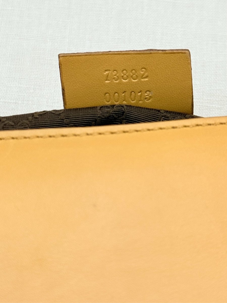 Pre - loved GUCCI Vintage Beige Baguette Bag at Reems Closet