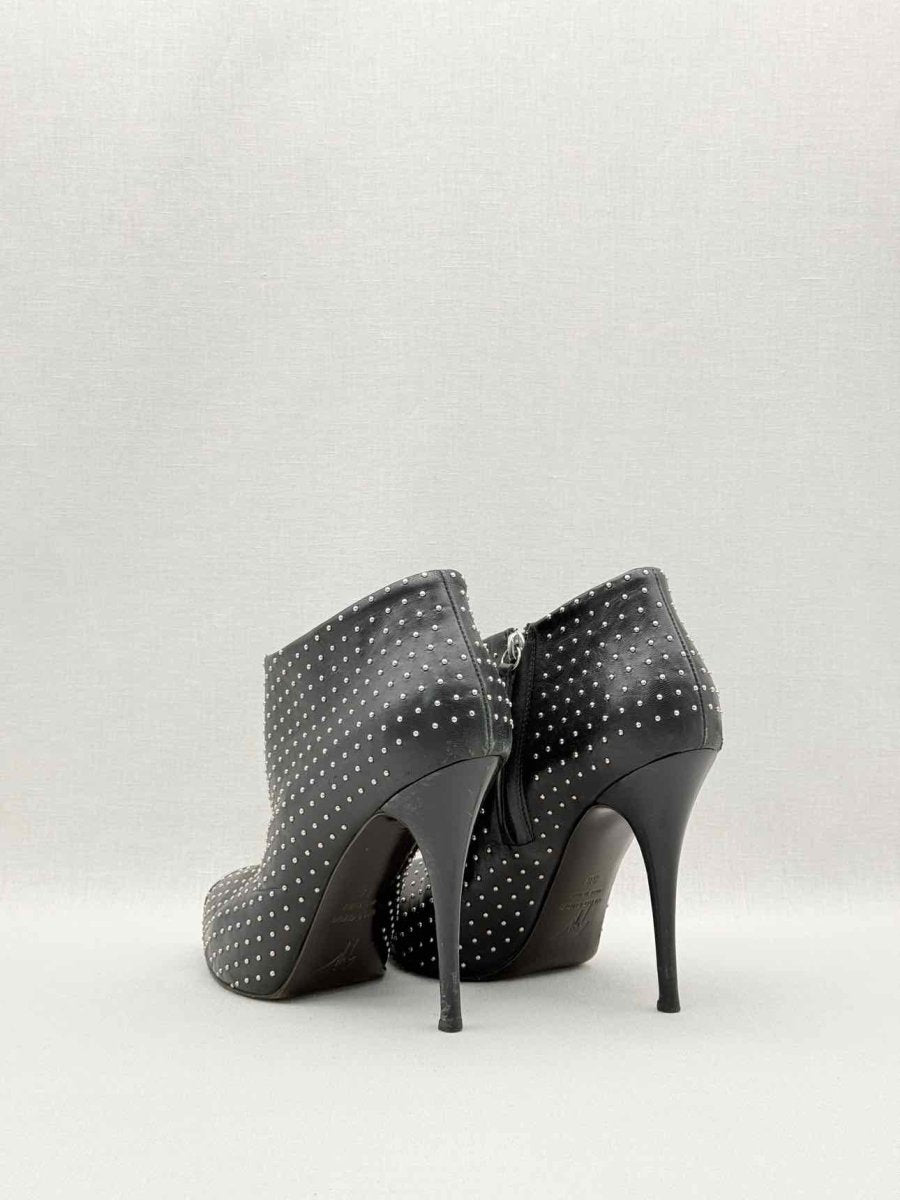 Pre-loved GUISEPPE ZANOTTI 2013 Black Cap Toe Size EU 38 Booties at Reems Closet