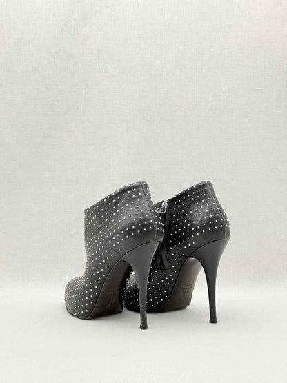 Pre-loved GUISEPPE ZANOTTI 2013 Black Cap Toe Size EU 38 Booties at Reems Closet
