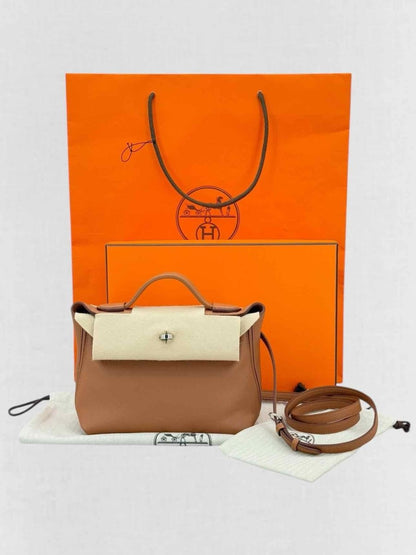 Pre - loved HERMES 24/24 Brown Top Handle at Reems Closet