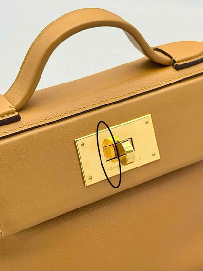 Pre-loved HERMES 24/24 Gold Top Handle at Reems Closet
