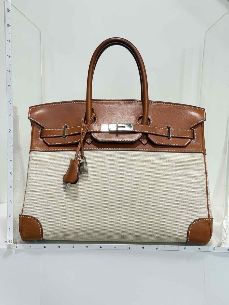 Pre - loved HERMES Birkin Cream & Brown Top Handle at Reems Closet