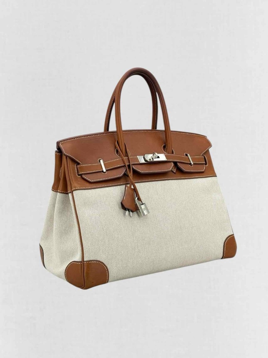 Pre - loved HERMES Birkin Cream & Brown Top Handle at Reems Closet