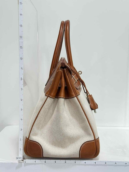 Pre - loved HERMES Birkin Cream & Brown Top Handle at Reems Closet