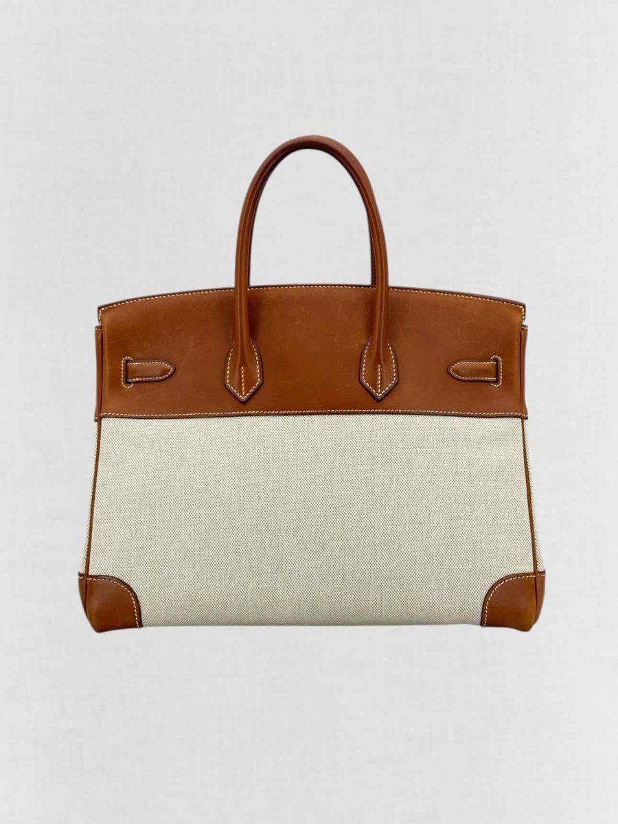 Pre - loved HERMES Birkin Cream & Brown Top Handle at Reems Closet