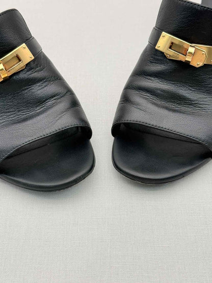 Pre-loved HERMES Candy Black Size EU 38 Mules at Reems Closet