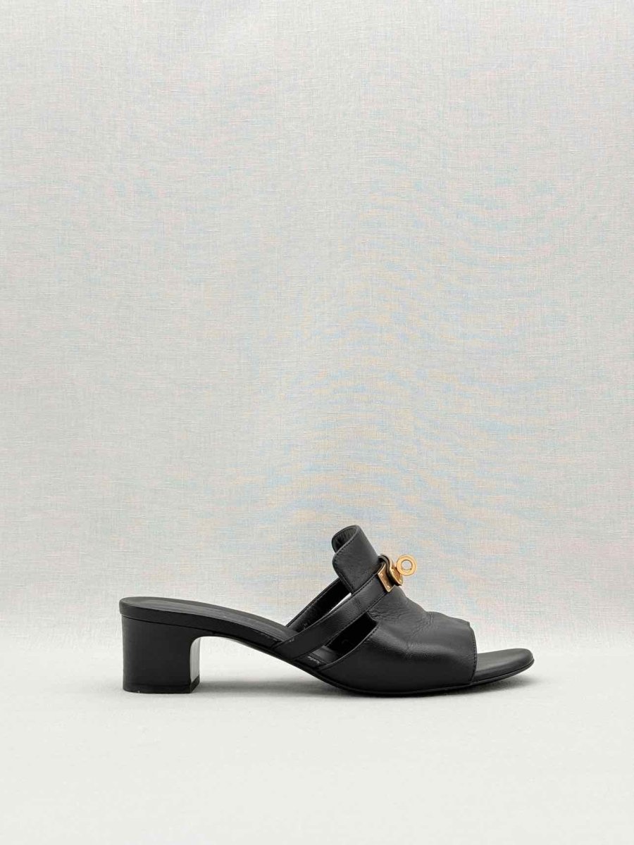 Pre-loved HERMES Candy Black Size EU 38 Mules at Reems Closet