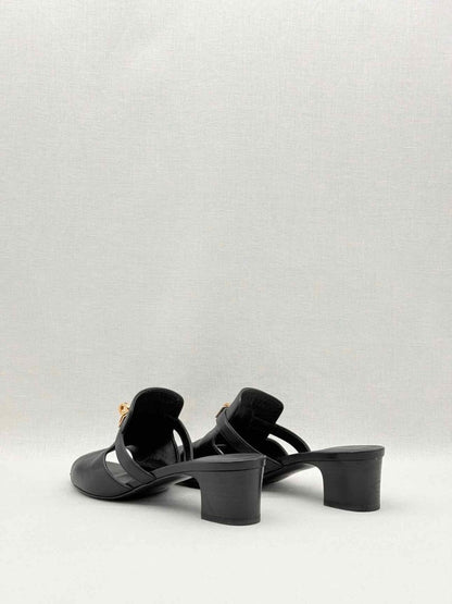 Pre-loved HERMES Candy Black Size EU 38 Mules at Reems Closet