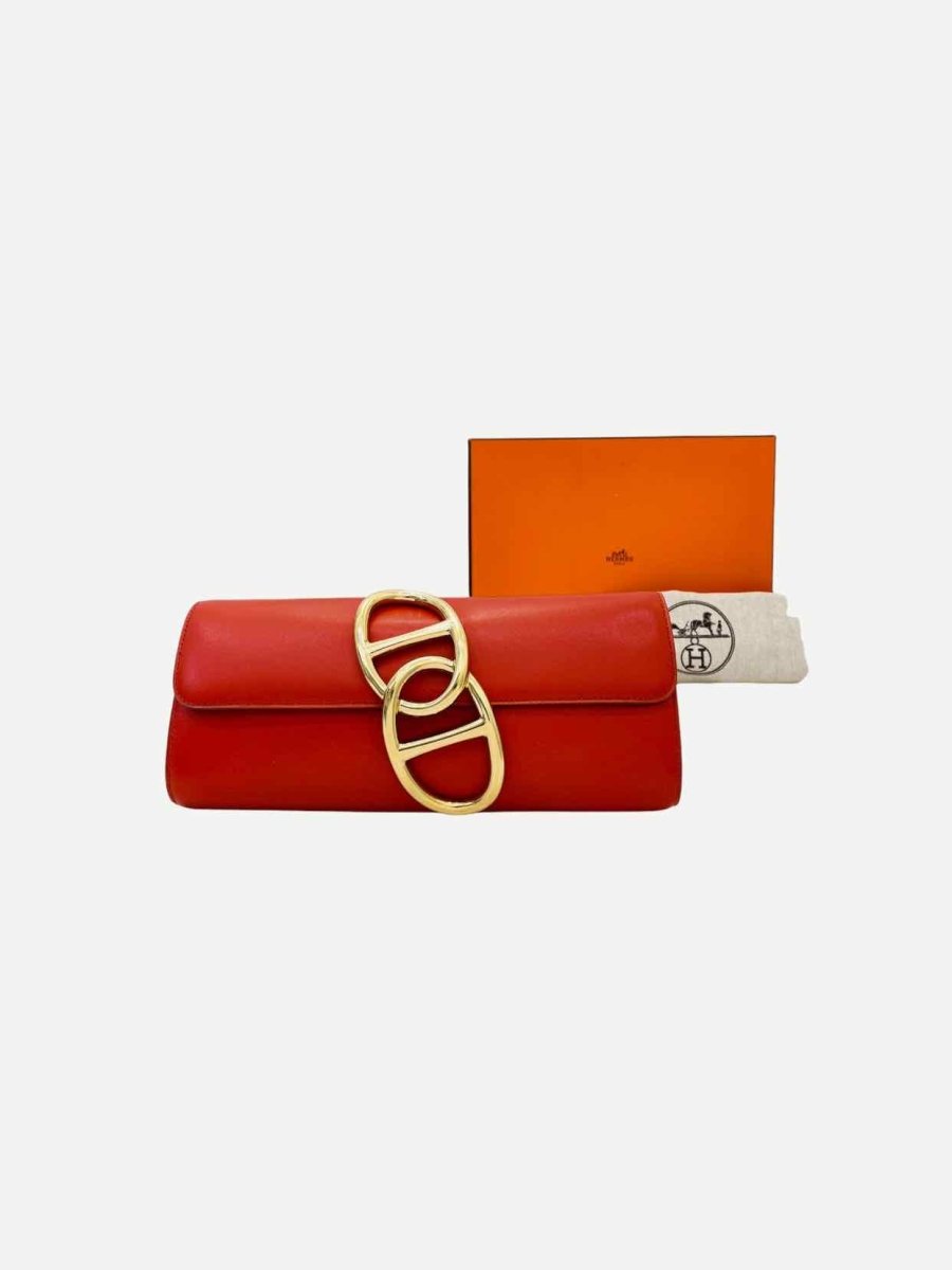 Pre - loved HERMES Clutch Rusty Orange Clutch at Reems Closet