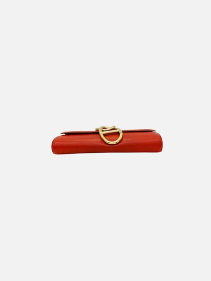 Pre - loved HERMES Clutch Rusty Orange Clutch at Reems Closet