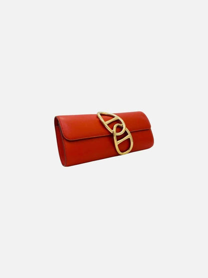 Pre - loved HERMES Clutch Rusty Orange Clutch at Reems Closet