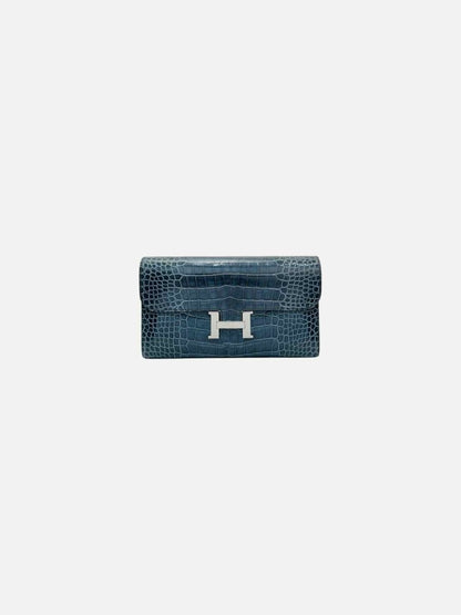 Pre - loved HERMES Constance Blue Continental Wallet at Reems Closet