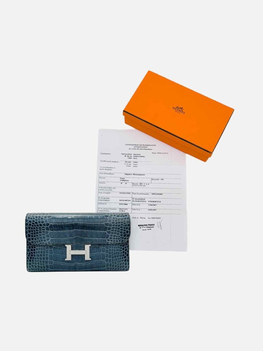 Pre - loved HERMES Constance Blue Continental Wallet at Reems Closet