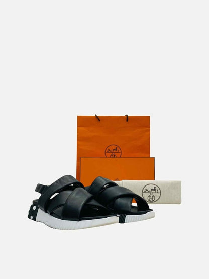 Pre-loved HERMES Electric Accent Ski Black Sandals from Reems Closet