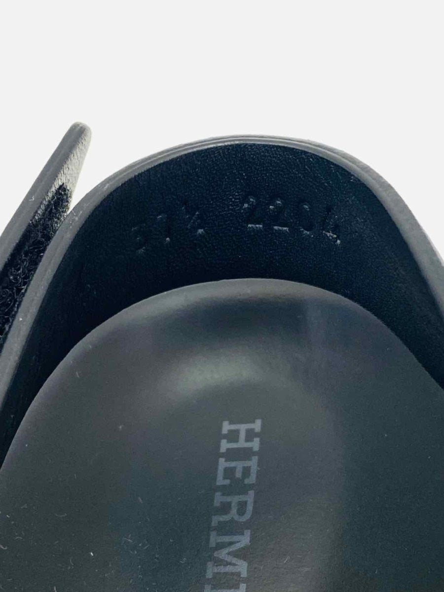 Pre-loved HERMES Electric Accent Ski Black Sandals from Reems Closet
