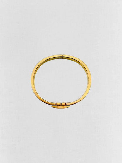Pre - loved HERMES Fashion Bangle at Reems Closet
