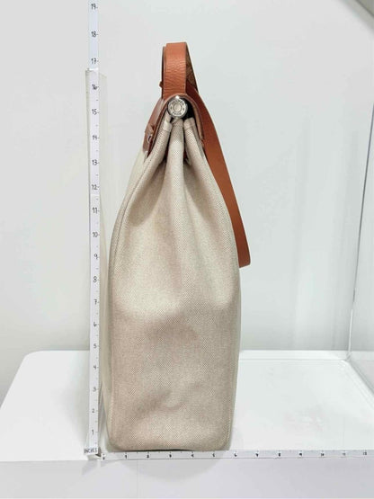 Pre-loved HERMES Herbag Naturel Top Handle at Reems Closet