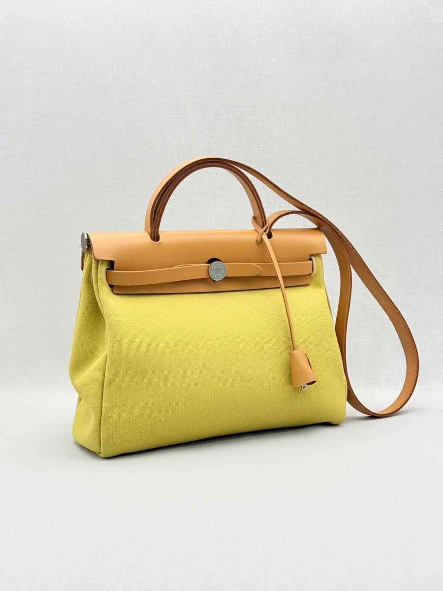 Pre - loved HERMES Herbag Zip Yellow Top Handle at Reems Closet