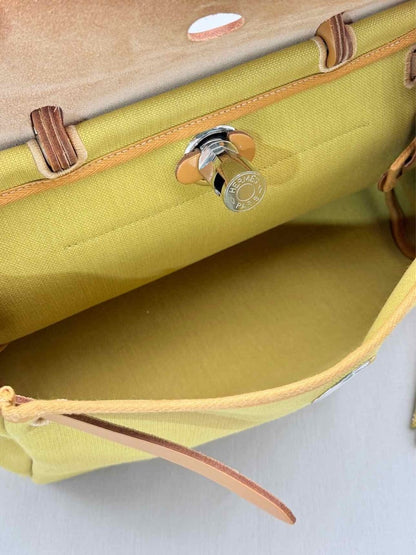 Pre - loved HERMES Herbag Zip Yellow Top Handle at Reems Closet