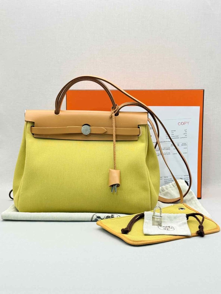 Pre - loved HERMES Herbag Zip Yellow Top Handle at Reems Closet