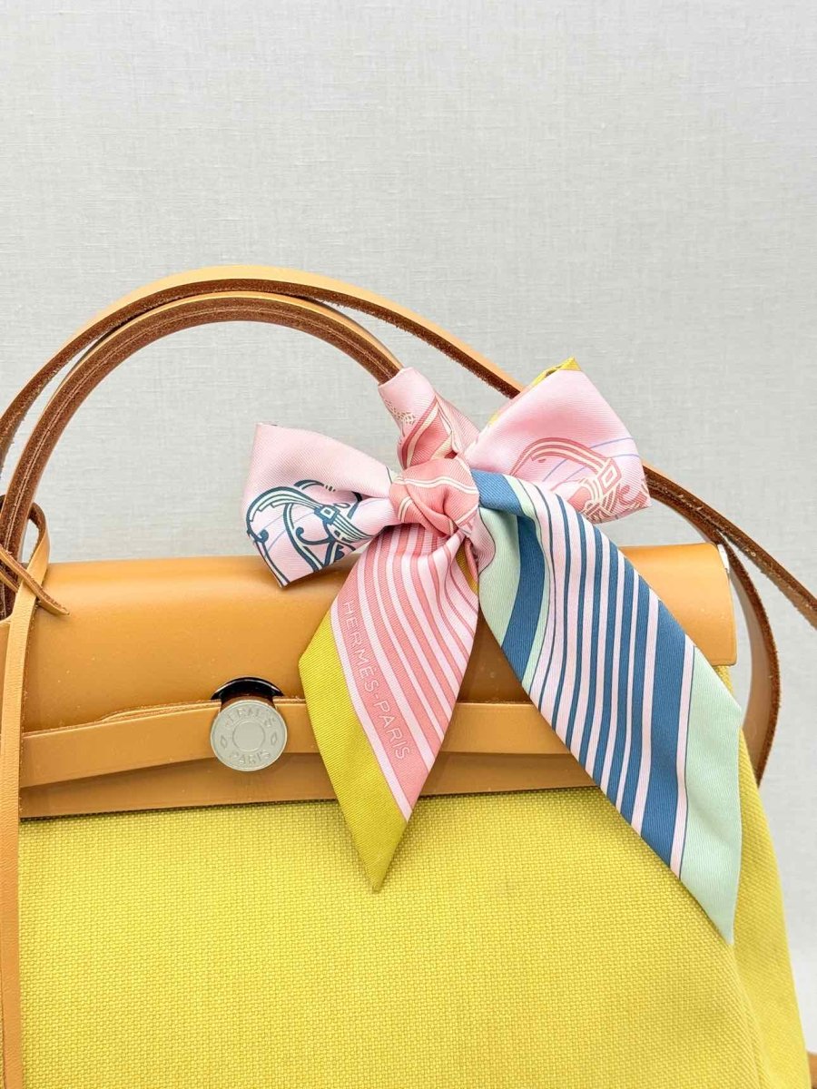 Pre - loved HERMES Herbag Zip Yellow Top Handle at Reems Closet