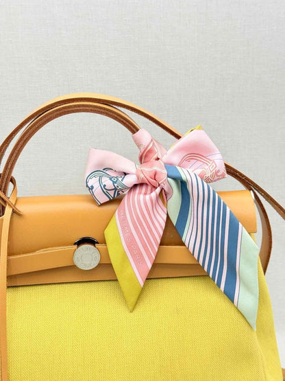 Pre - loved HERMES Herbag Zip Yellow Top Handle at Reems Closet