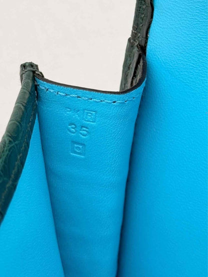 Pre-loved HERMES Jige Elan Vert Emerald Clutch at Reems Closet