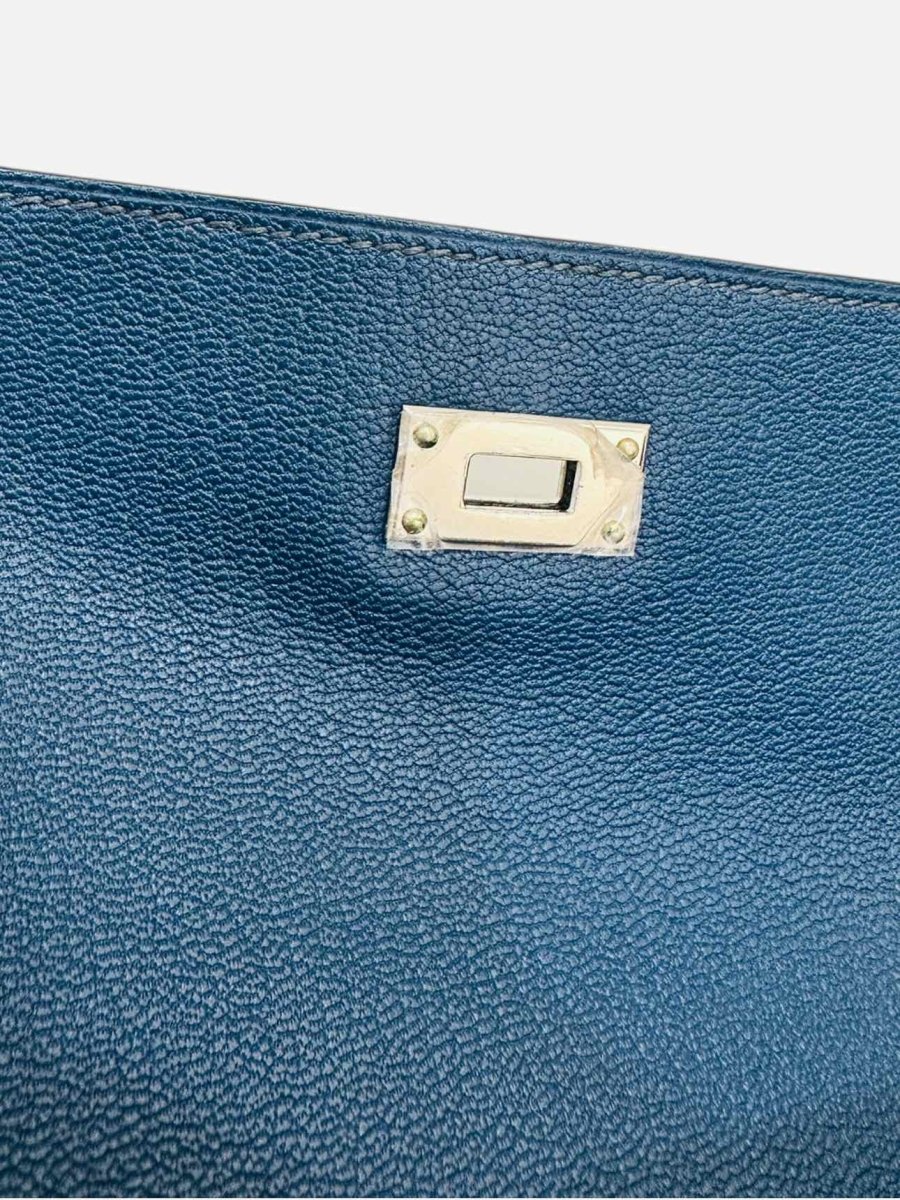 Pre - loved HERMES Kelly Classic Blue Continental Wallet at Reems Closet