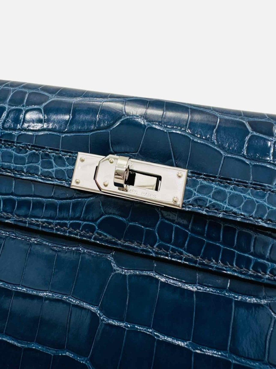 Pre - loved HERMES Kelly Classic Blue Continental Wallet at Reems Closet