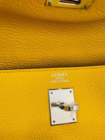 Pre - loved HERMES Kelly Jaune Citron Top Handle at Reems Closet