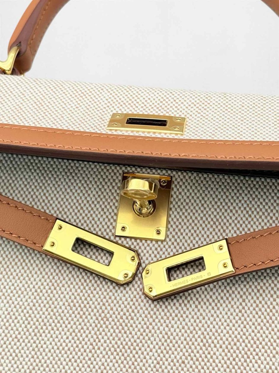 Pre-loved HERMES Kelly Sellier Ecru Gold Top Handle at Reems Closet