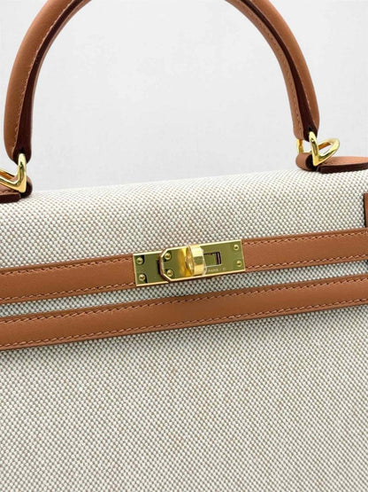Pre-loved HERMES Kelly Sellier Ecru Gold Top Handle at Reems Closet